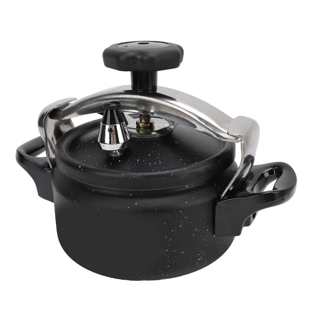 Black speckled pressure cooker with stainless lid cover, steam valve, and curved side handles