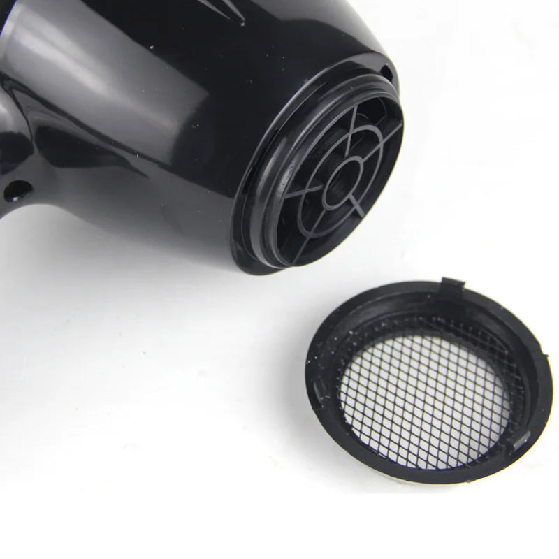 Black professional hair dryer with removable air filter mesh for easy cleaning and maintenance.