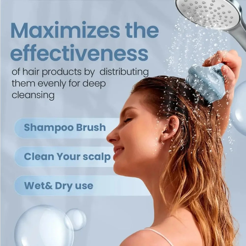 A person uses a light blue, round silicone scalp massager brush in the shower under a stream of water.