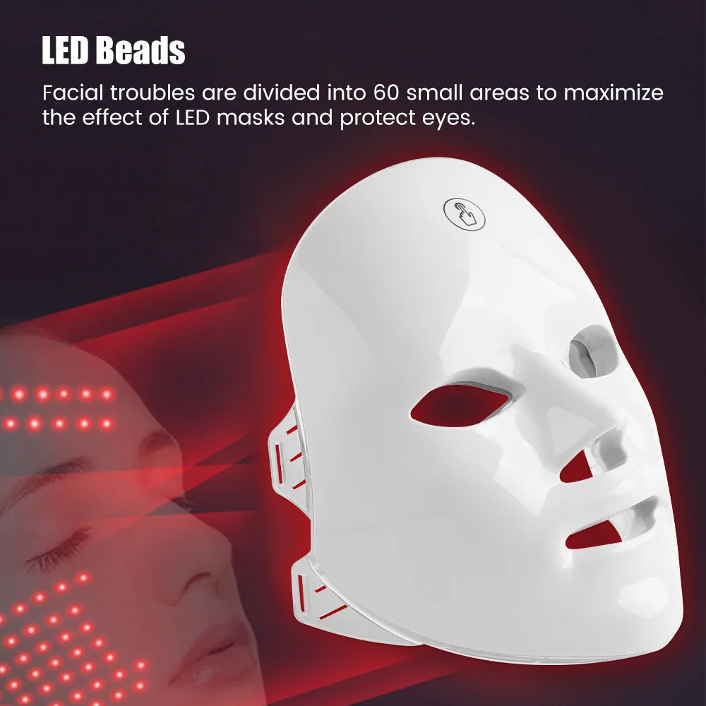 White, smooth facial LED beauty mask with a touch-control sensor, emitting red light over a user’s face.