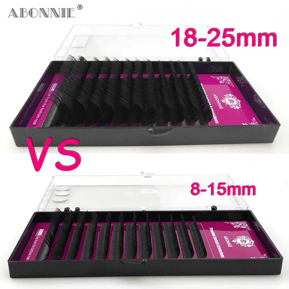 Two black trays of synthetic eyelash extensions in 8-15mm and 18-25mm lengths for professional lash application.