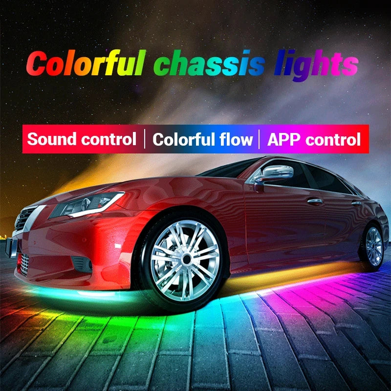Multicolor LED car underglow lights with app and sound control, mounted beneath a red sedan on a brick surface.