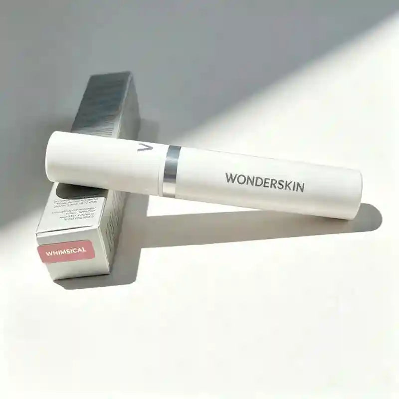 Wonderskin peel-off tattoo lip stain in Whimsical, a long-lasting waterproof matte lip tint in white tube packaging.