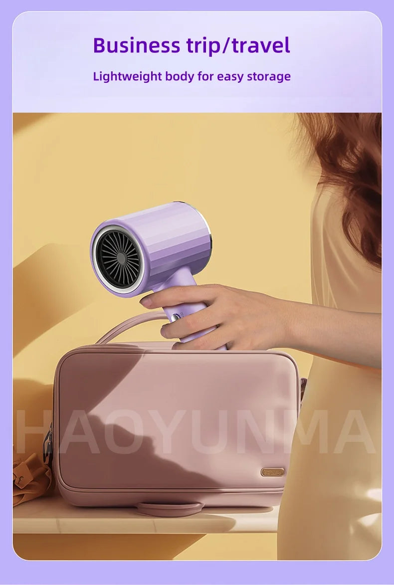 Purple 2400W ionic hair dryer for travel. Compact, silent, quick-drying professional salon blow dryer in a pouch.
