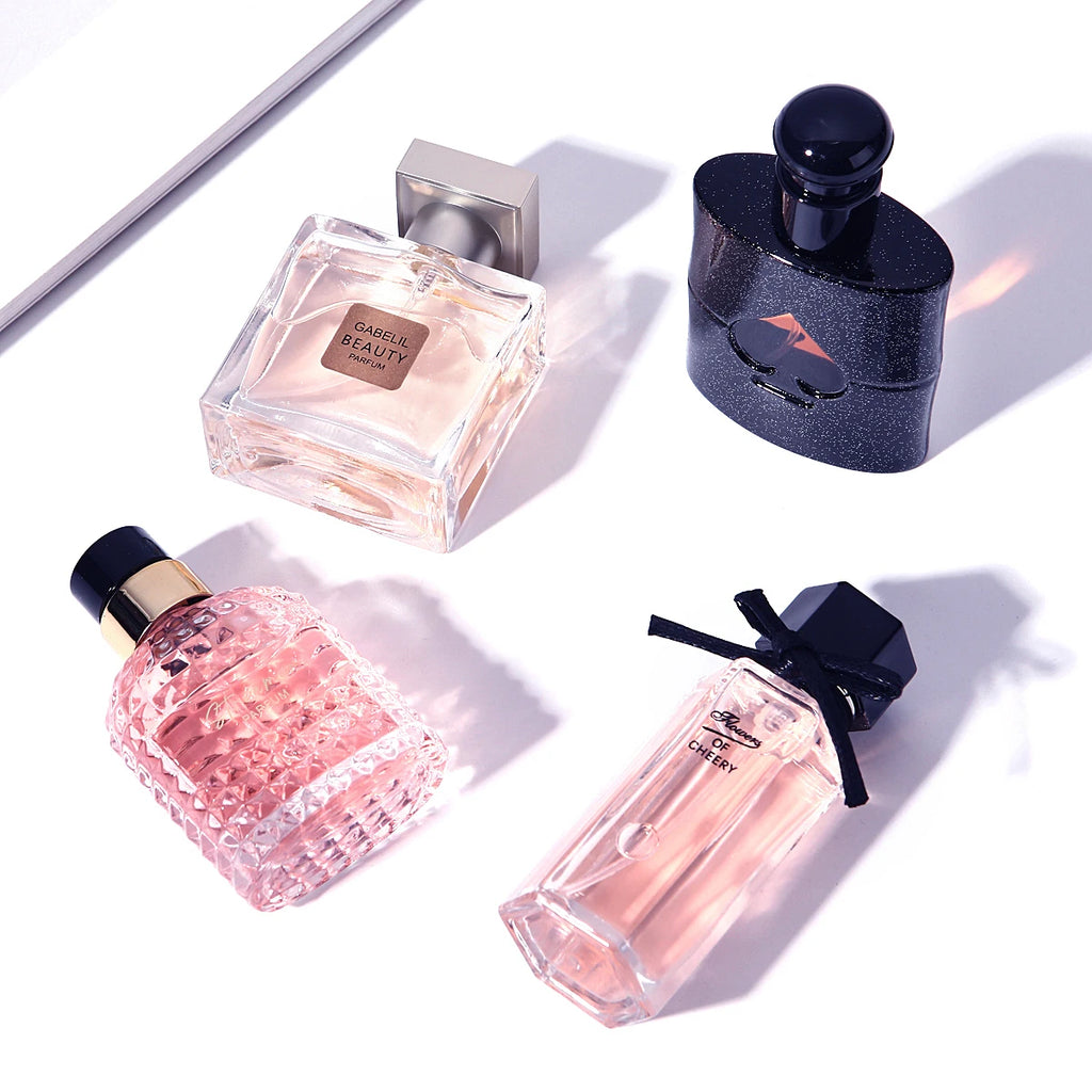 Gabelil Beauty gift set: 4 assorted floral & fresh EDT perfume bottles for women and men, long-lasting scent.