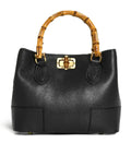 Black pebbled genuine leather designer handbag with bamboo top handle and gold bamboo-style turn-lock closure.