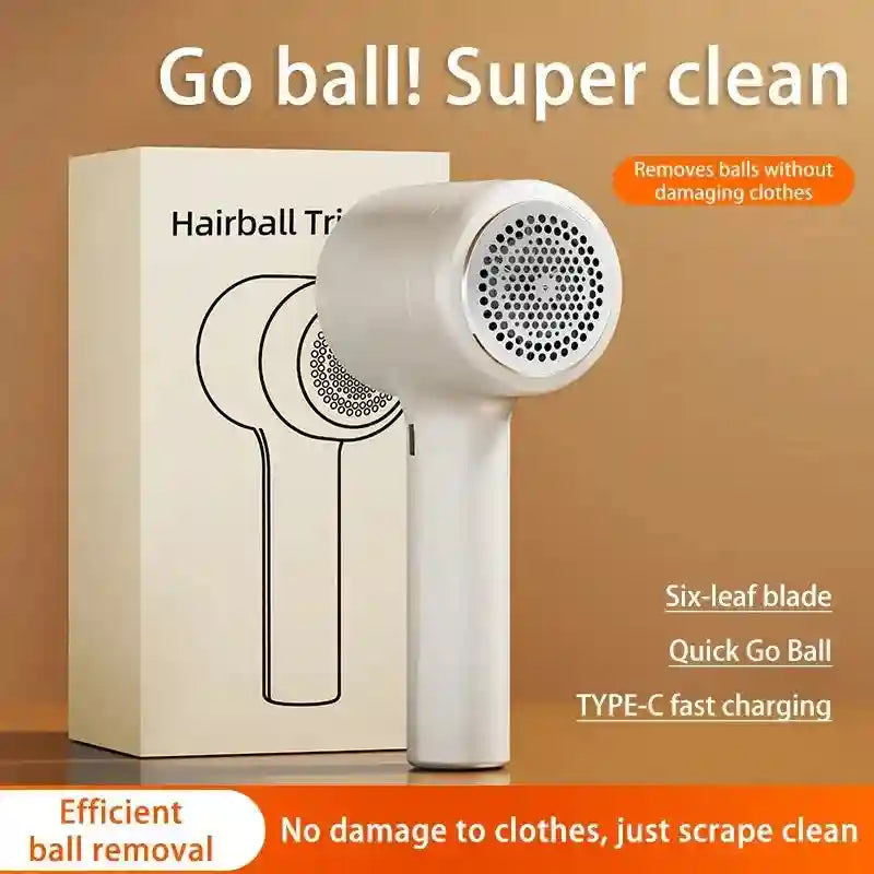 Tidesmit rechargeable fabric shaver removing lint and hair balls from clothing, showing detailed shaving head design.