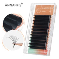 Tray of matte black synthetic lash extensions for professional volume application, shown in a clear plastic case.