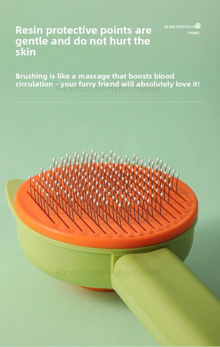 Green and orange cat grooming brush with gentle resin-tipped bristles for comfortable pet hair removal and massage.