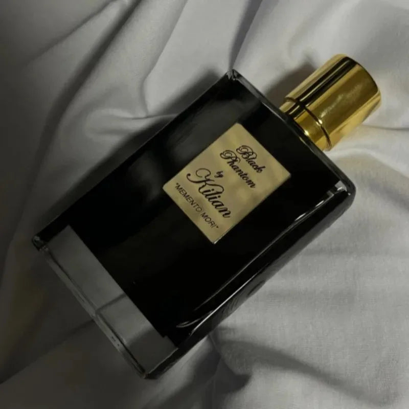 Kilian Black Phantom EDP: Unisex woody spicy oriental 50ml perfume in a sleek, rectangular black bottle with gold cap.