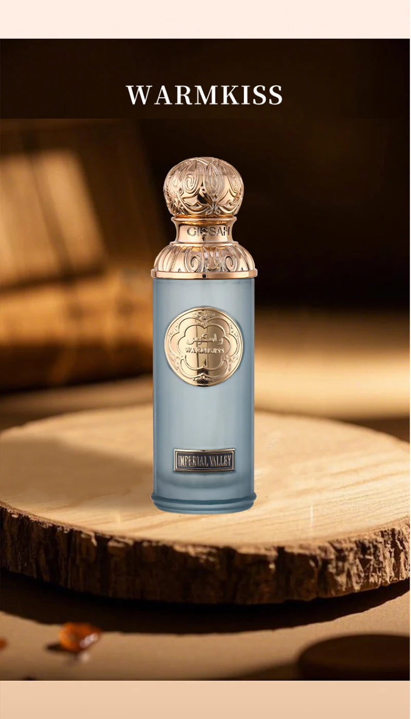 Gissah Warmkiss Imperial Valley unisex EDP: 100ml luxury oud perfume in ornate gold-capped cylindrical bottle.