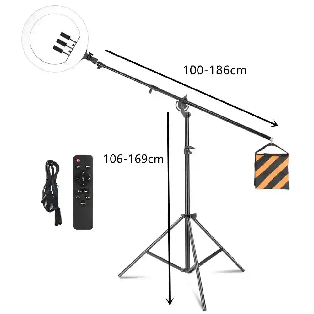 Ring light on adjustable boom arm tripod stand with counterweight bag, power cable, and remote for studio photography.