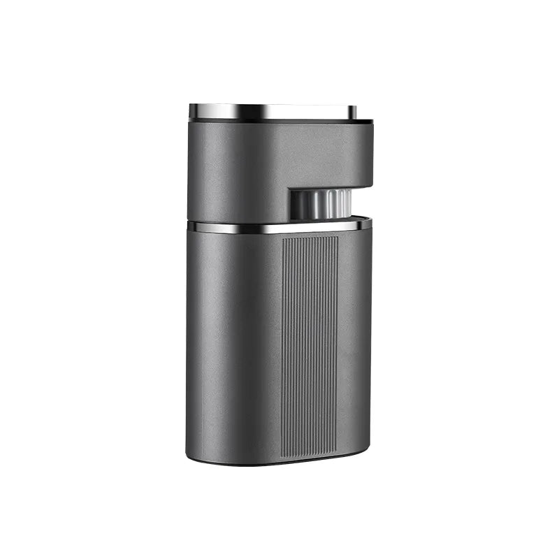 Matte grey portable coffee grinder with brushed metal accents and vertical ribbed texture on a sleek cylindrical body.