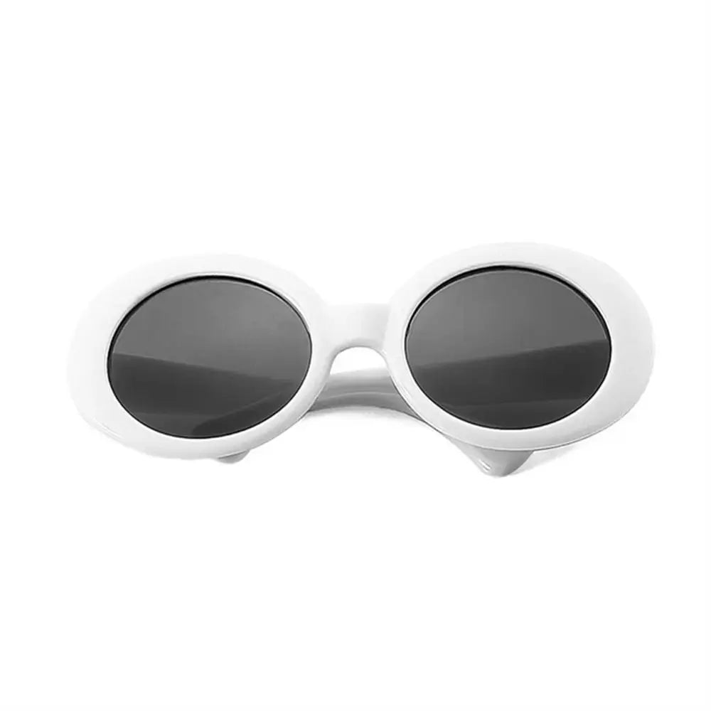 Tidesmit white oval doll sunglasses with dark, round lenses on a plain white background.