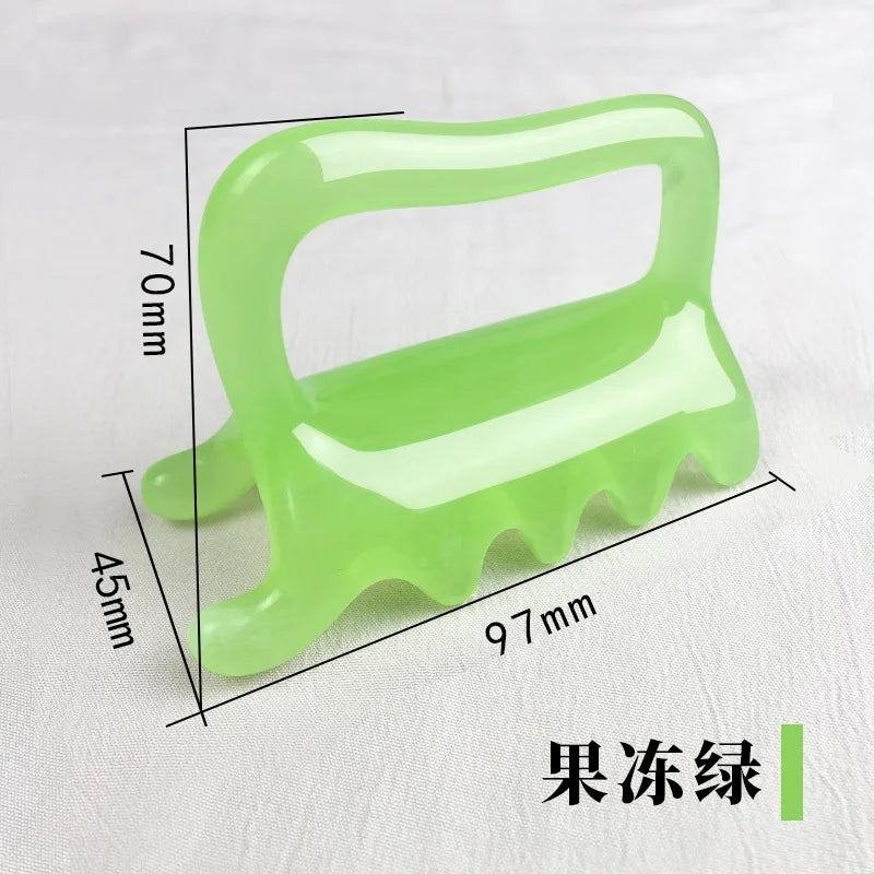 Light green jade-style gua sha massage tool with a handle and four-pronged comb edge, measuring 97mm x 70mm x 45mm.