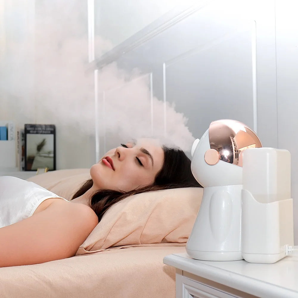Woman resting as a white and rose gold nano ionic facial steamer sprays steam for skincare and pore cleaning.