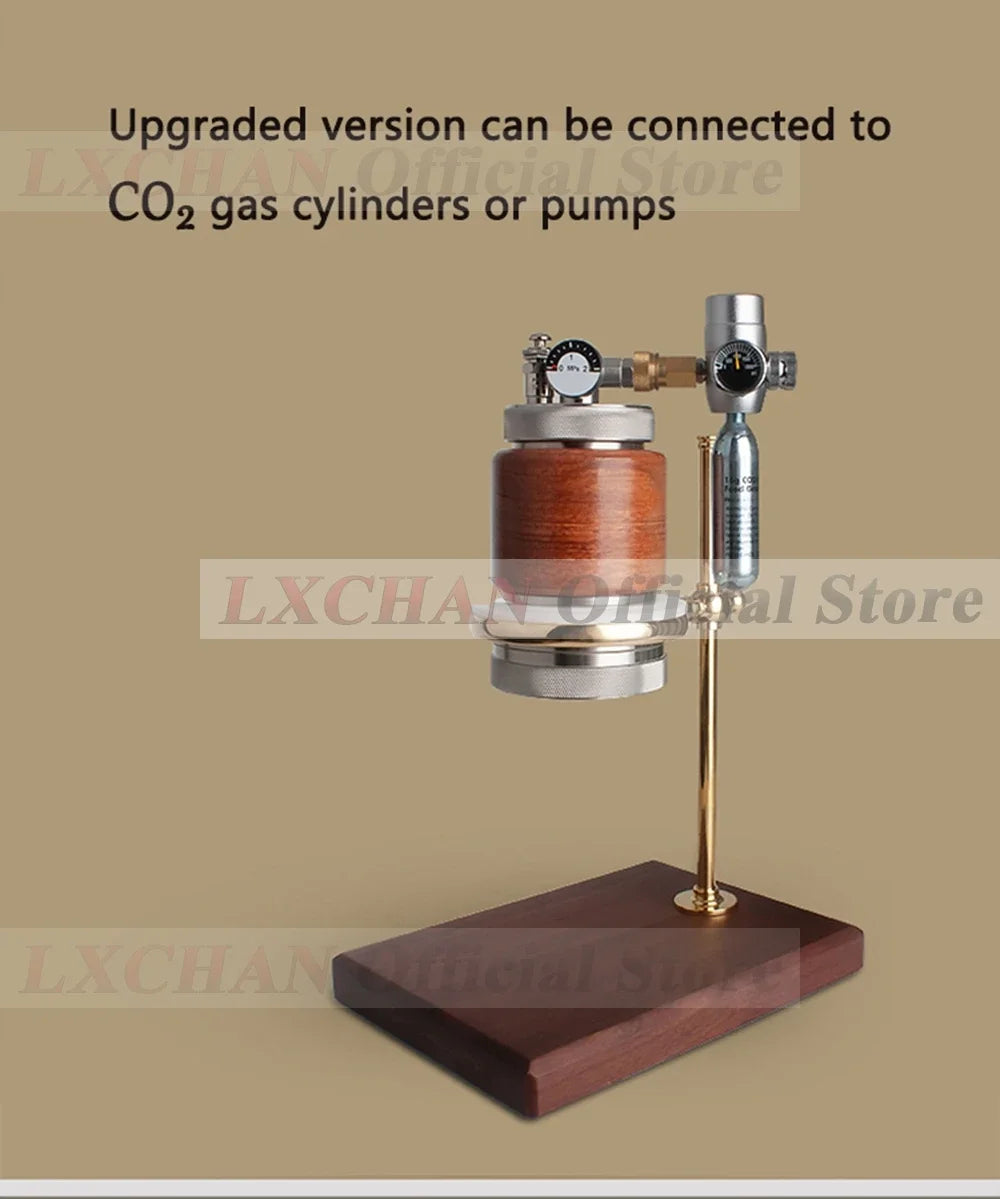 LXCHAN portable CO2 coffee maker with wooden base, metal chamber, and pressure gauge on a gold stand.