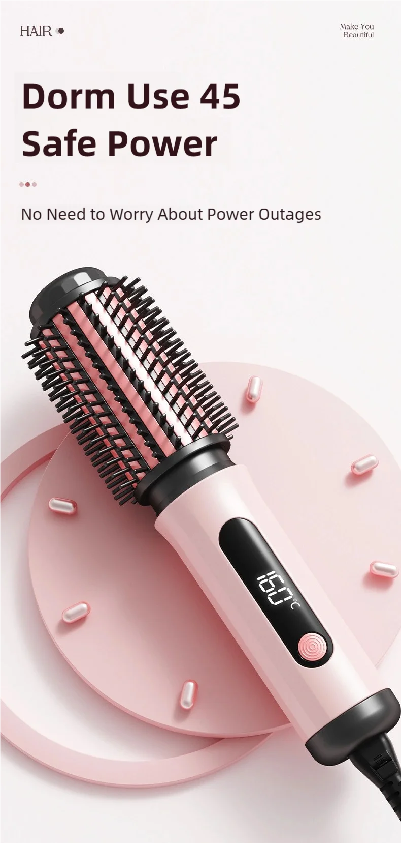 Pink TINSOL negative ion hot air brush with LED temperature display for professional hair styling and straightening.