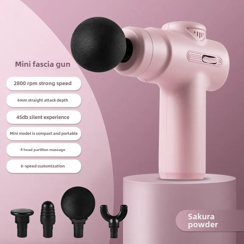 Pink mini muscle massage gun with four interchangeable black heads for portable deep tissue recovery.
