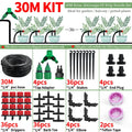 Drip irrigation kit set with coiled 30M hose, adapters, stakes, and barb tees