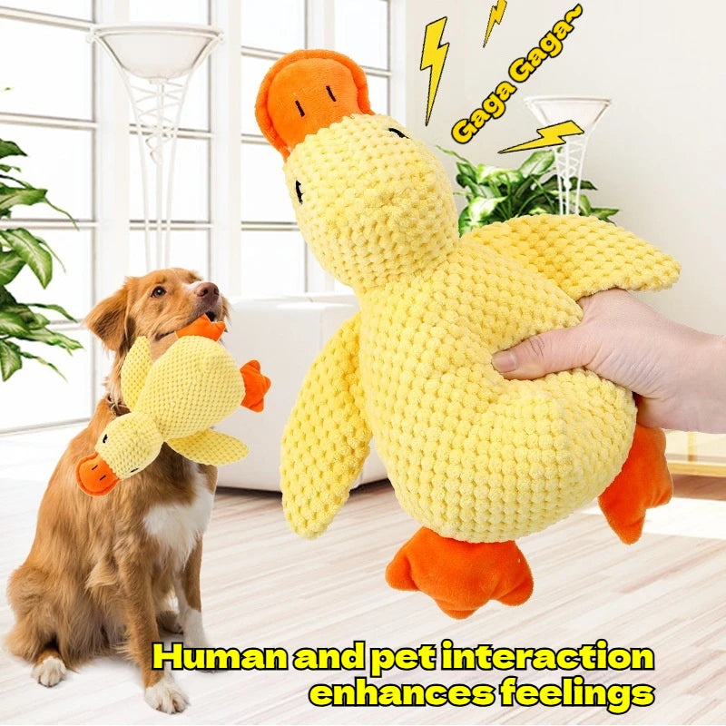 Bite-resistant yellow plush duck dog toy for interactive play, teeth cleaning, and pet boredom relief.