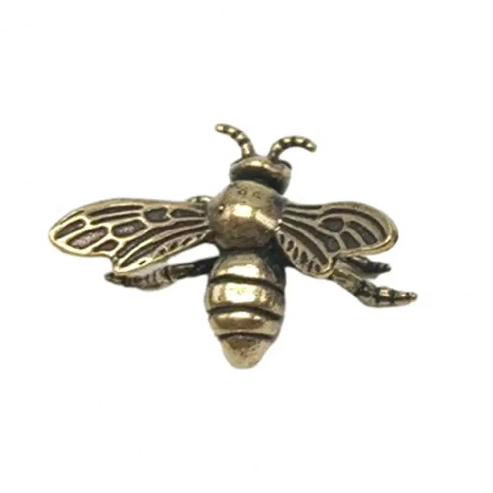 Solid brass bee tea pet figurine, golden metal sculpture for desk decor and collectible tabletop ornament.