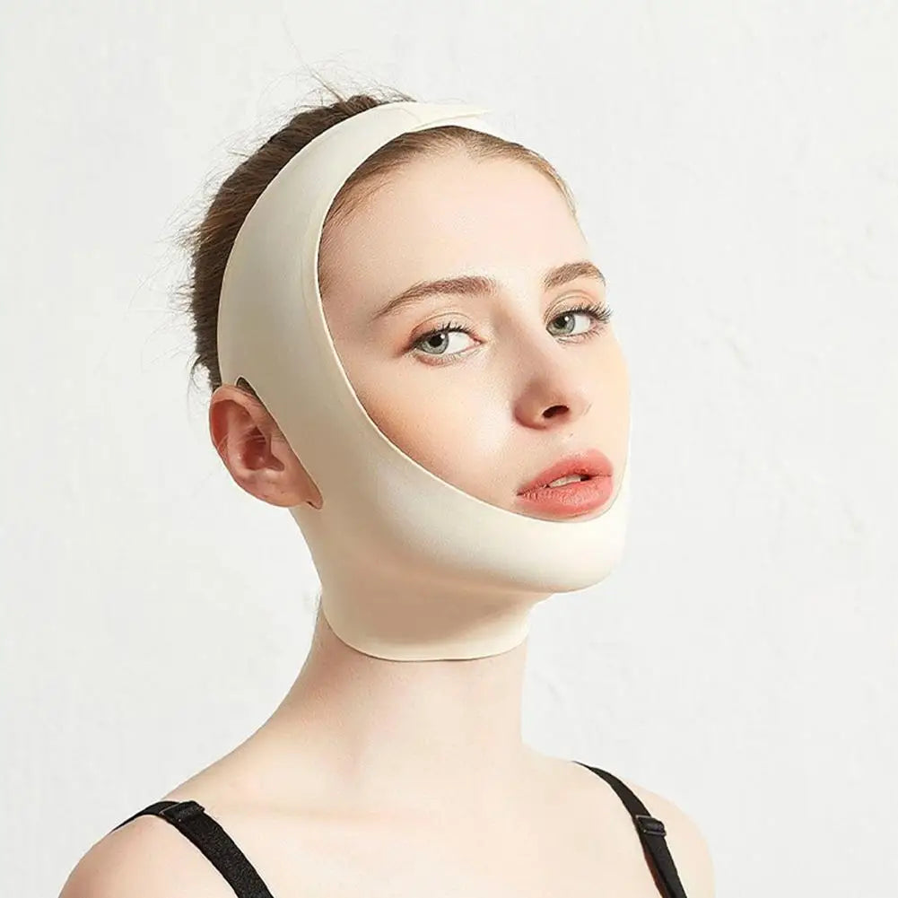 A woman wearing a smooth, beige V-shaped facial slimming bandage that wraps around the chin and over the head.