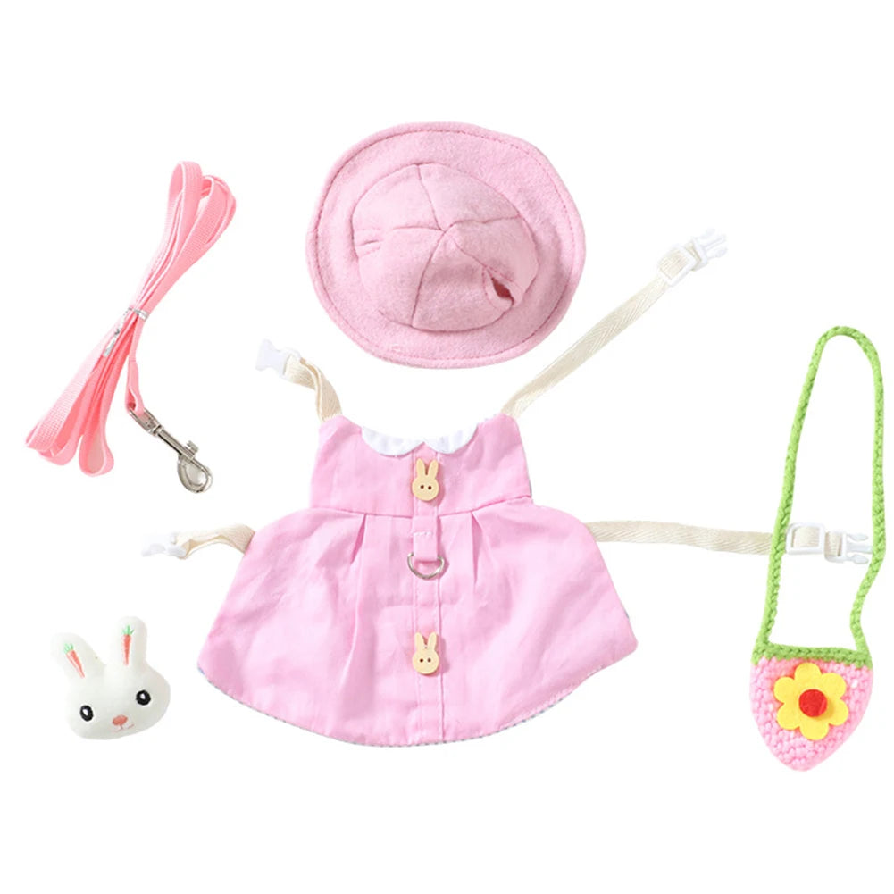 Cute pink bunny harness dress set with leash, sun hat, and bag for walking rabbits or guinea pigs outdoors.
