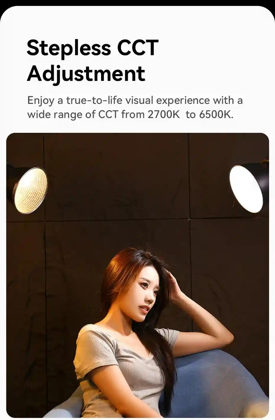 Two black round studio lights with adjustable color temperature, illuminating a person sitting in a chair.