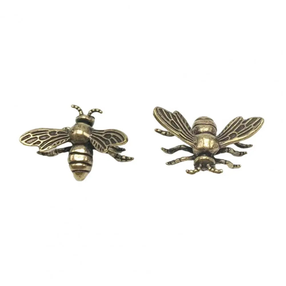 Two realistic golden brass bee tea pet figurines for decorative desktop display and collectible home decor.