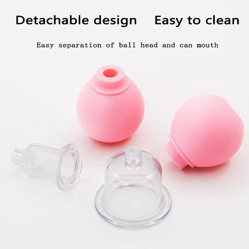 Two pink rubber squeeze bulbs and two detachable clear plastic suction cups for facial cupping therapy.