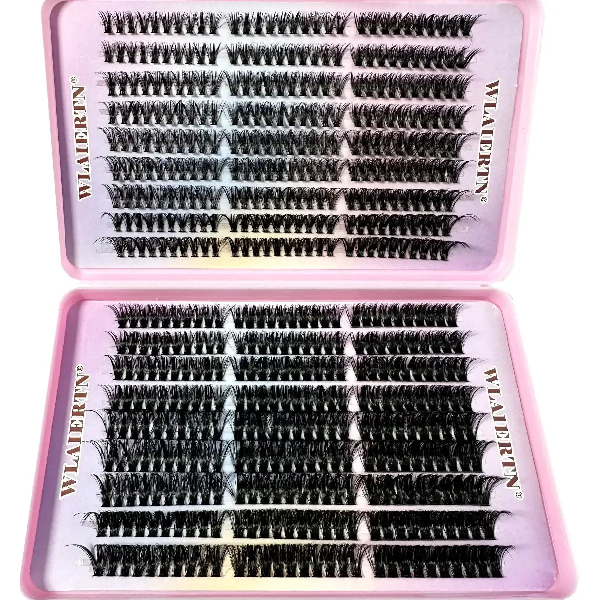 Rows of individual black synthetic eyelash clusters arranged in a pink plastic case for makeup application.
