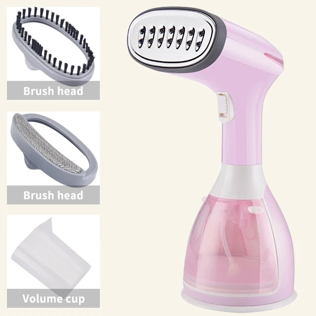 Pink handheld garment steamer with oval steam head and visible water tank cup