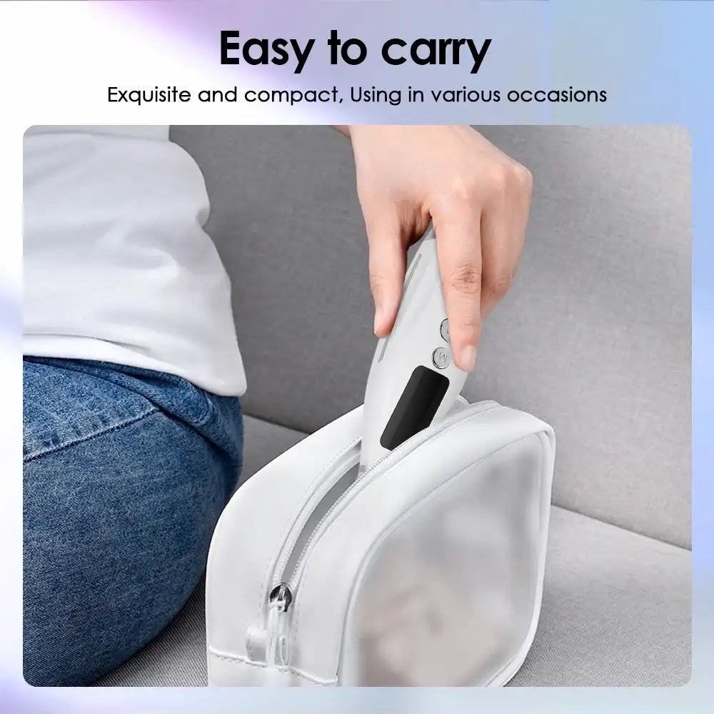 A hand placing a sleek, white, ergonomic LED face and neck beauty device into a small white travel pouch.