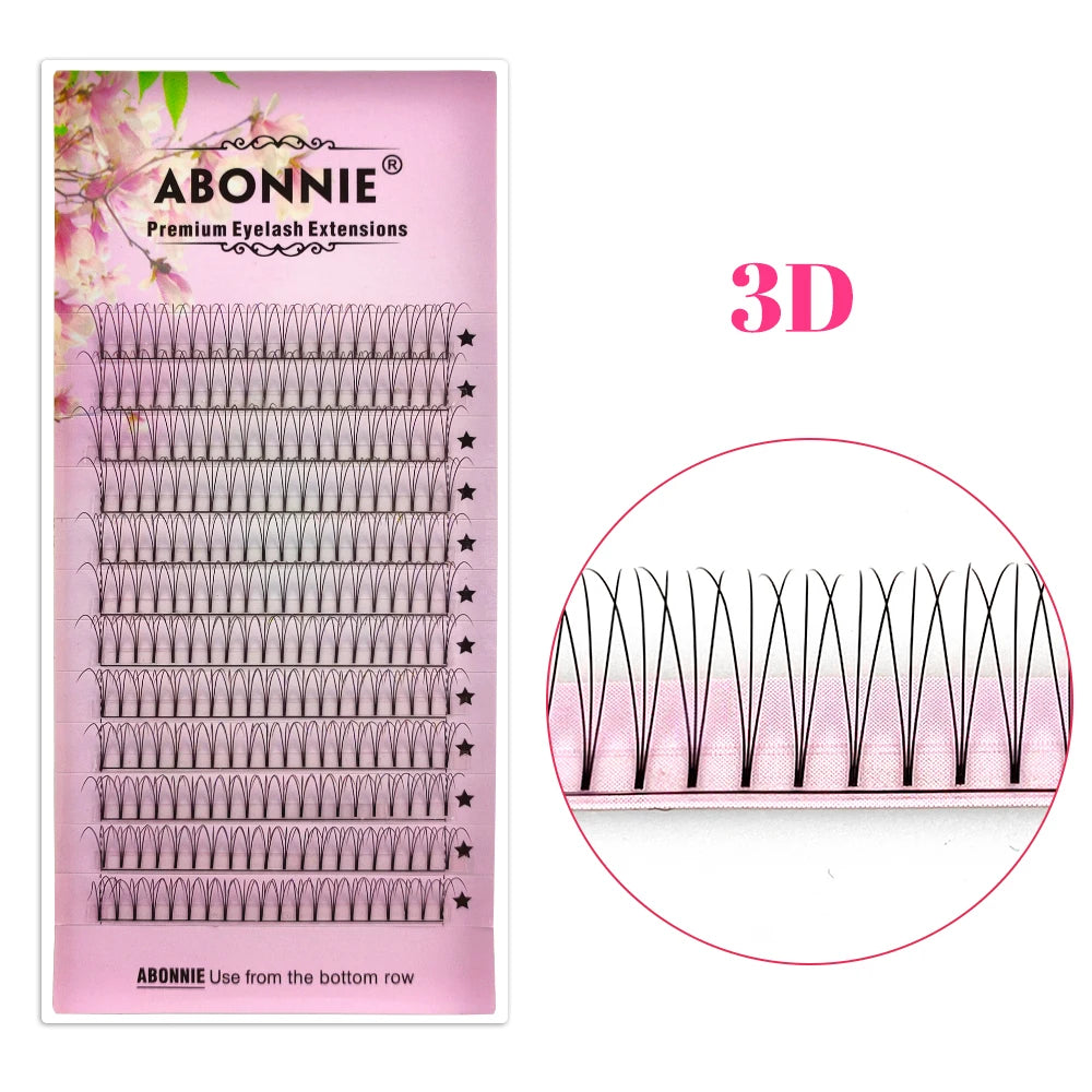 Abonnie 3D premade volume eyelash extension tray in pink packaging with a close-up of the black short-stem fans.