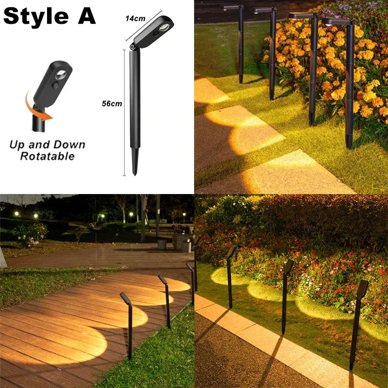 Black rotatable LED solar landscape spike lights illuminating a garden path.