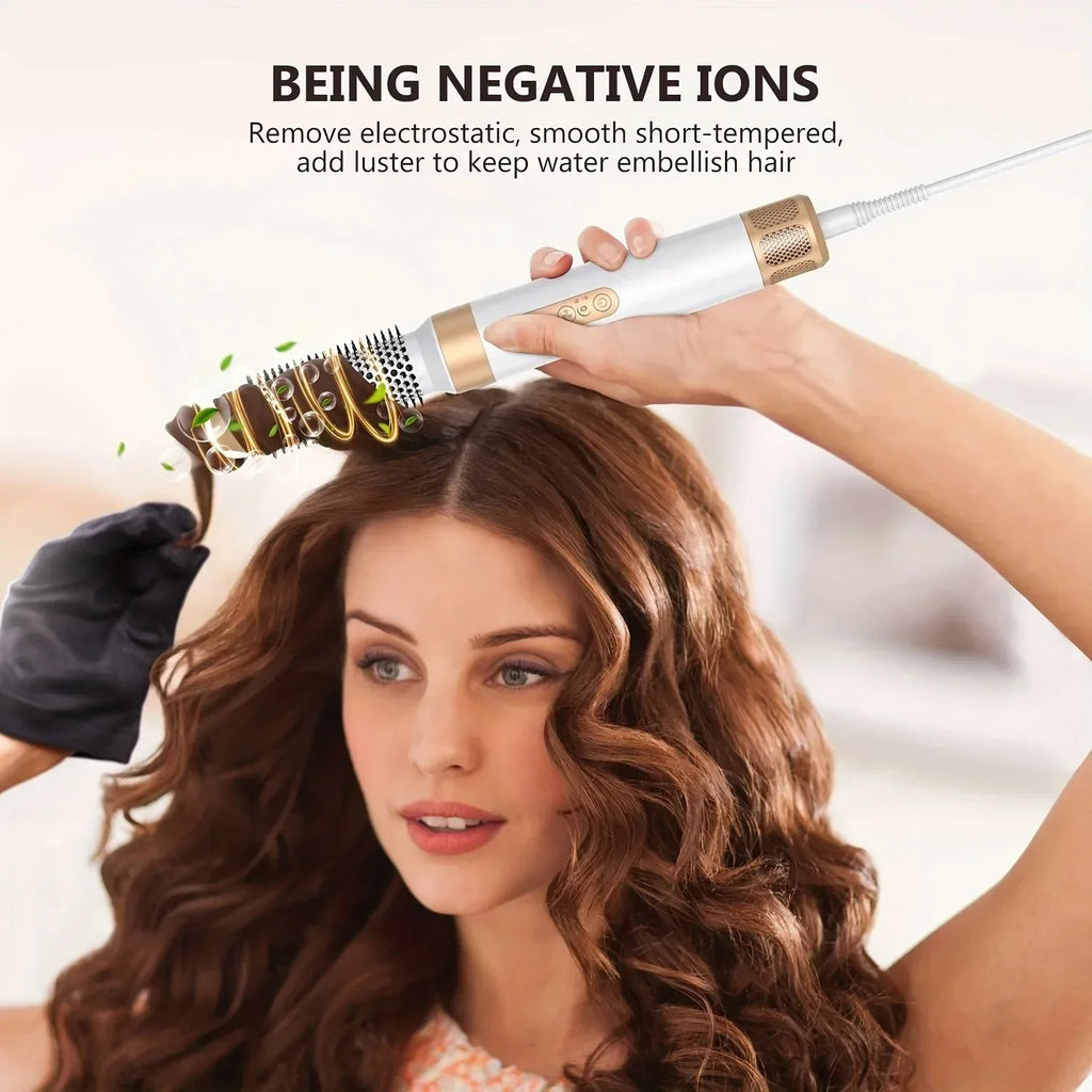 TINSOL 1400W 7-in-1 ionic hair dryer brush in white and gold styling hair for a smooth, professional salon finish.