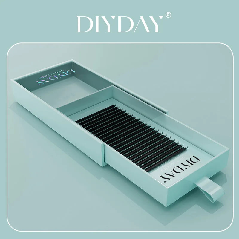 DIYDAY 16-row black individual mink lash extension tray in a sleek, light blue sliding pull-out box.