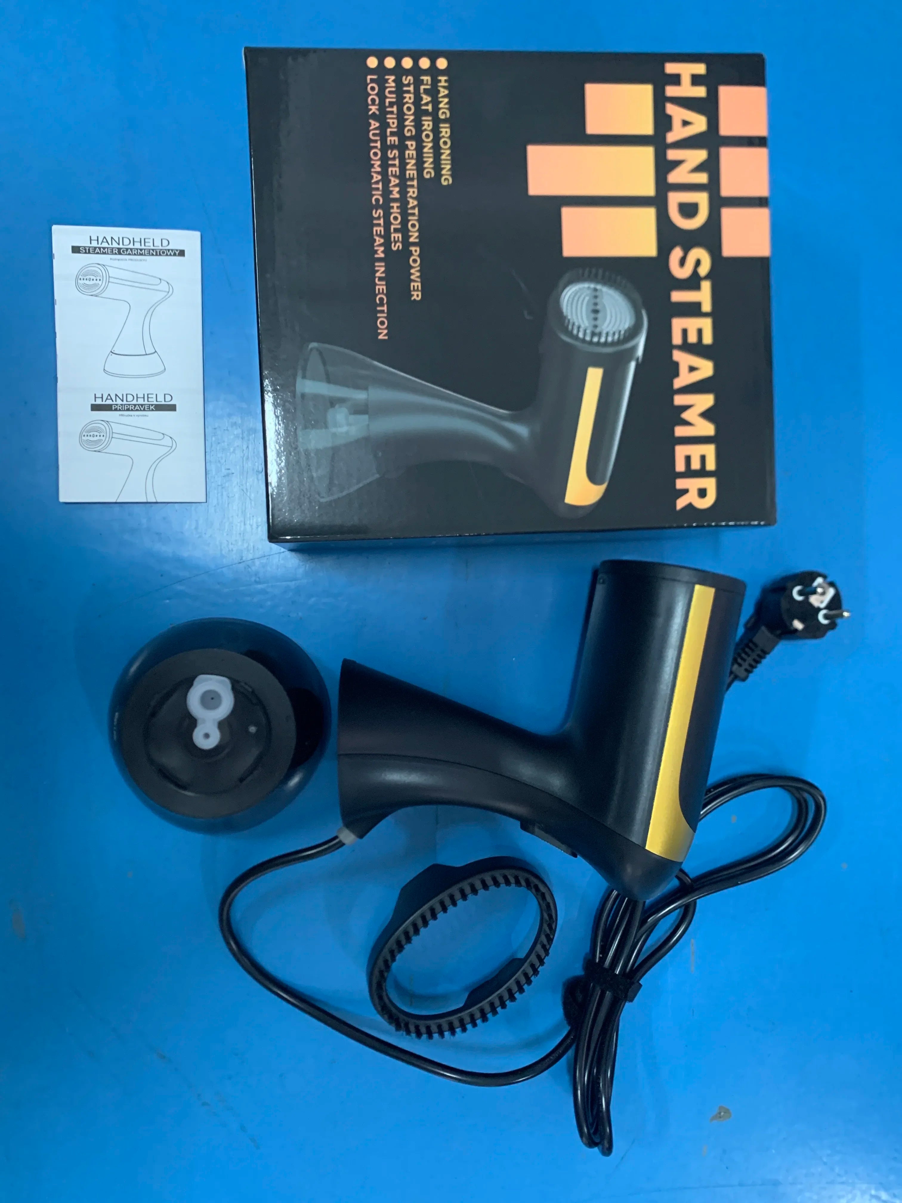Tidesmit 1500W foldable handheld garment steamer showing the compact design and adjustable steam head for travel