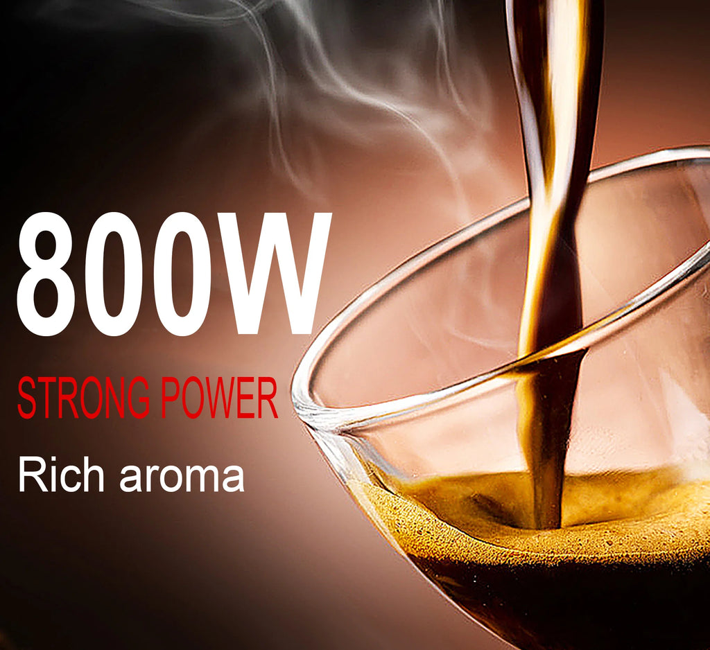 800W coffee maker pouring hot, fresh espresso into a clear glass cup with rich crema and steam.