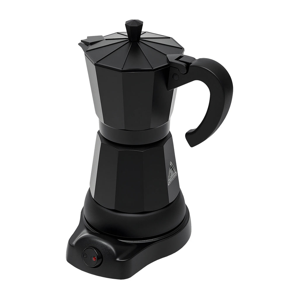 Matte black electric moka pot coffee maker on a charging base with a sleek, faceted octagonal design.