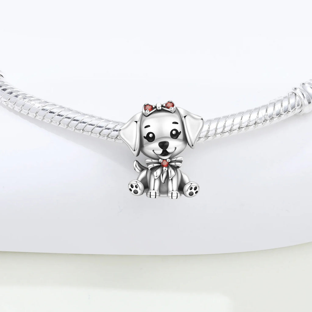 Cute 925 sterling silver dog charm with red bow for DIY charm bracelets, perfect trendy gift for pet lovers.