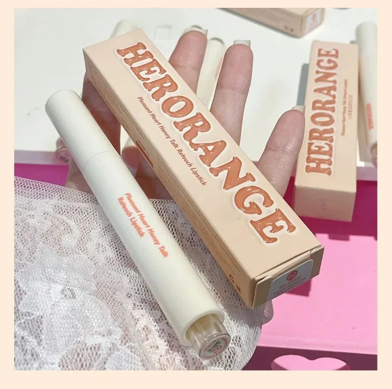 Herorange moisturizing jelly lipstick pen in peach packaging. Mirror-shine finish, K-beauty style lip glaze.