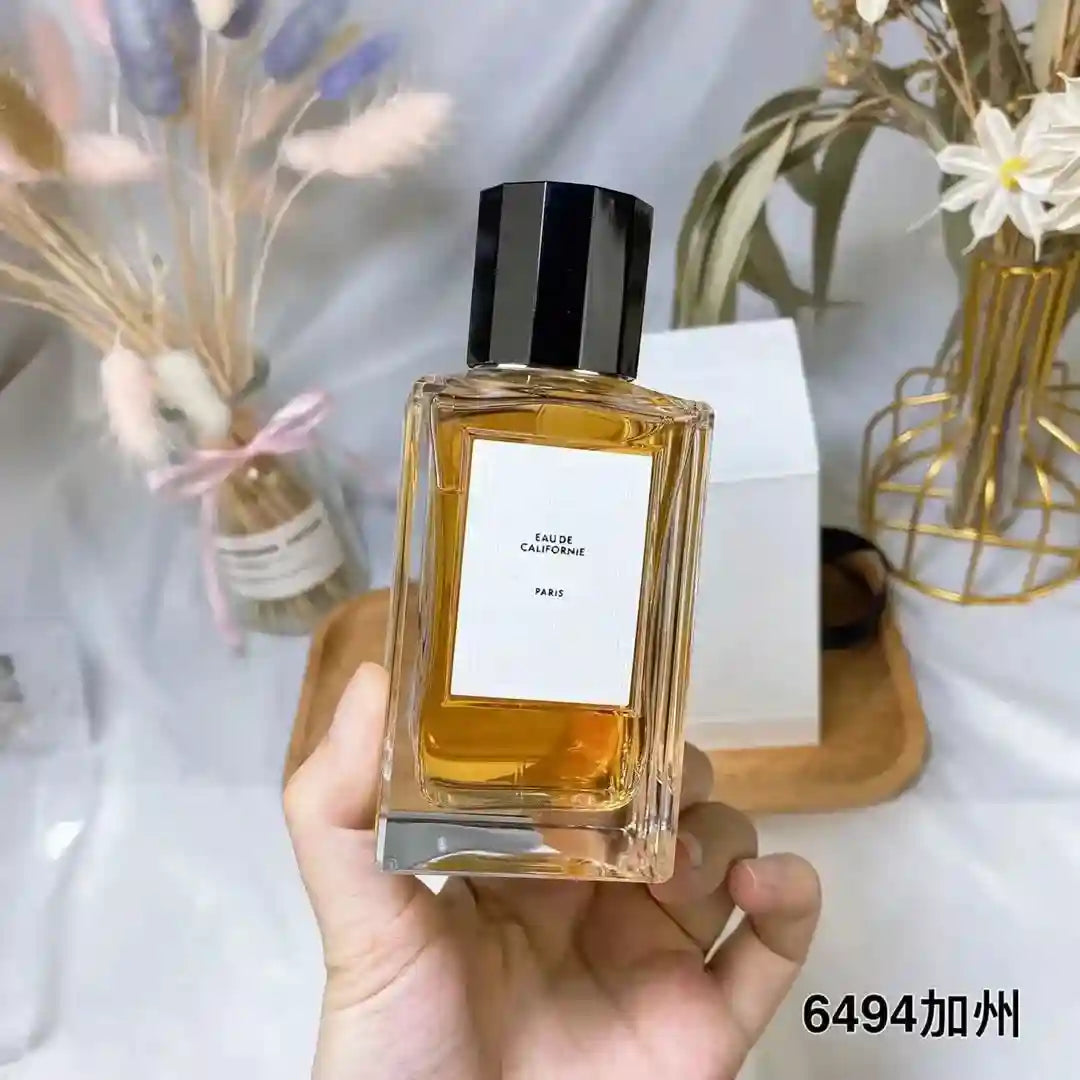 Dansparis Eau de Californie unisex perfume, rectangular glass bottle, luxury long-lasting fragrance for men and women.