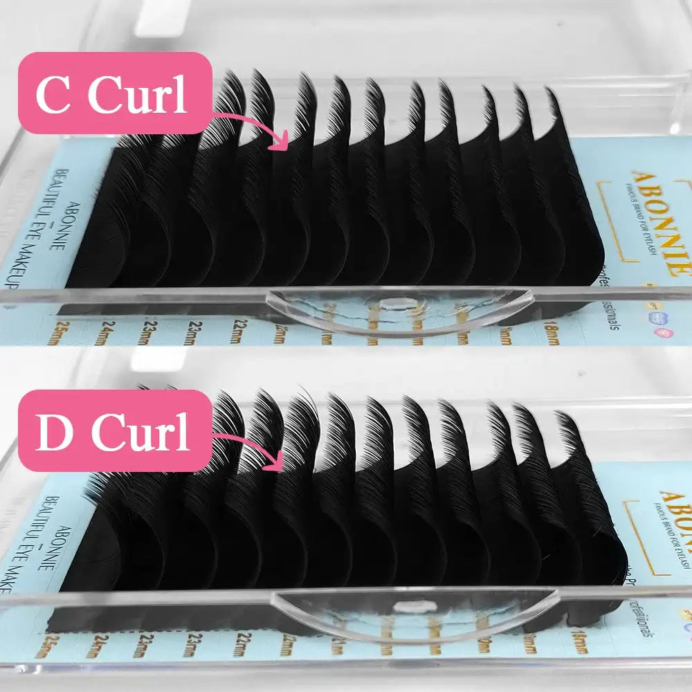 Abonnie ultra-matte black individual eyelash extensions in C and D curl styles, neatly organized in trays.