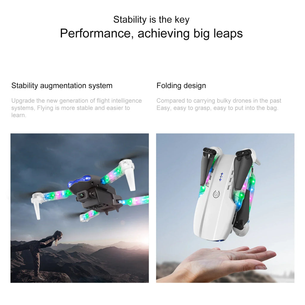 Foldable white and black drone with multicolor LED lights in flight and held in hand.