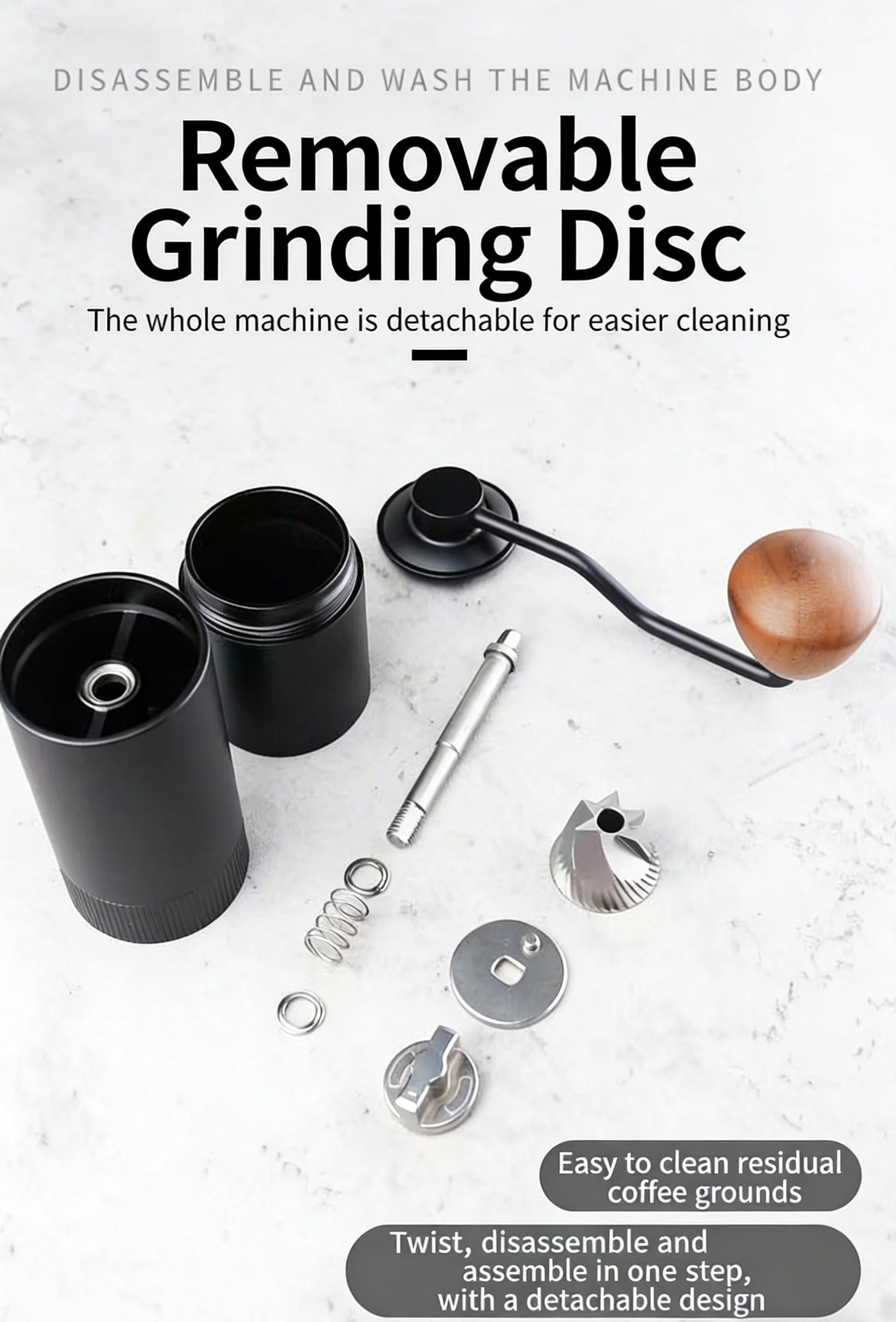 Black manual coffee grinder disassembled with metal burr, handle, and wooden knob for easy cleaning and maintenance.