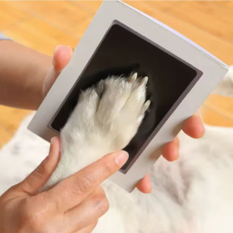 Inkless ink pad kit for pet paw prints: non-toxic, mess-free souvenir tool for capturing dog footprints safely.