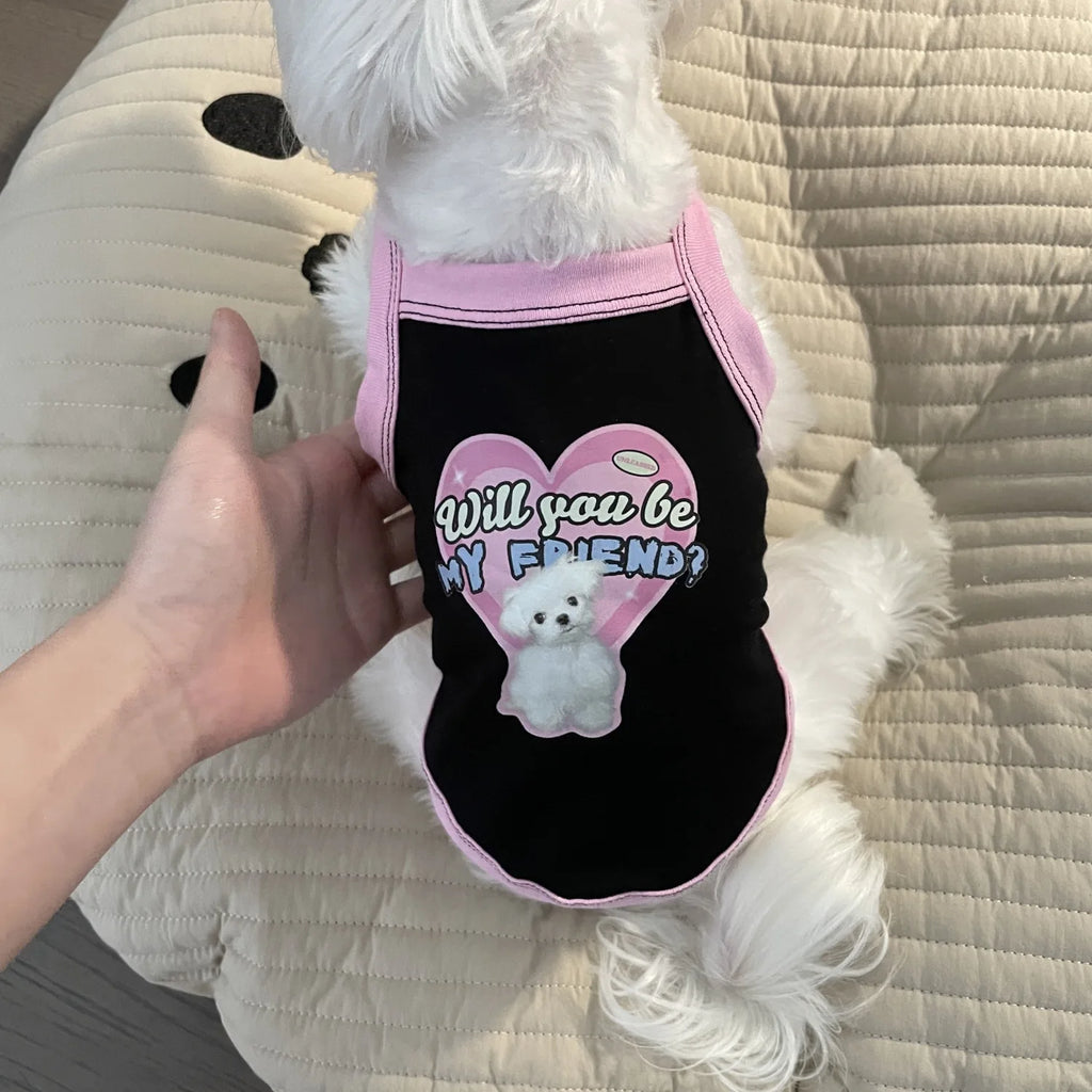 Cute black and pink puppy vest with heart graphic for small dogs, perfect for comfortable spring pet fashion.