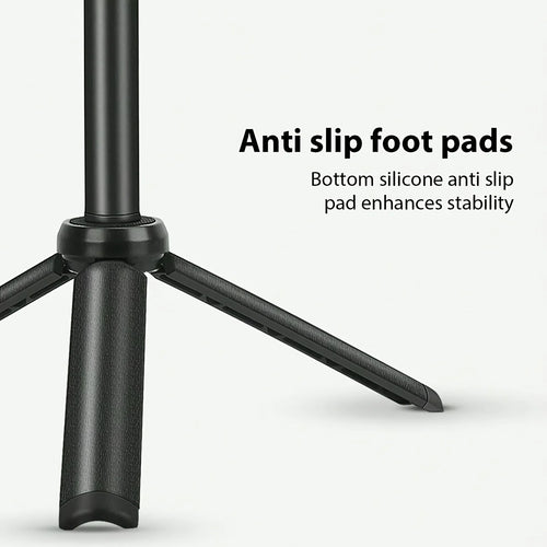Black tripod base with textured legs and silicone anti-slip pads for stable positioning on flat surfaces.